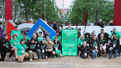 The Kinetic Knights Robotics Team of Kincardine stands in front of the FIRST sign in downtown Houston, Texas, at the World Robotics Championships, just before leaving Saturday evening | photo by Jason Geberdt