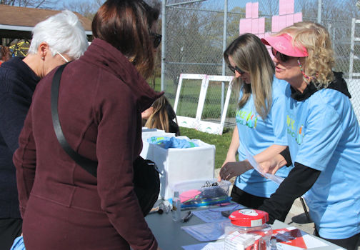 Marlene Morrow (right) and Arius Ricketts register participants in Saturday's Hike for Hospice in Kincardine|