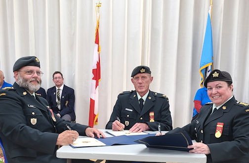 Signing the documents for the Kincardine Air Cadets Change of Command, are Captain Richard Miller (left) who is stepping down, Major Bill Dobson of CFB Borden and new commanding officer Captain Patricia Coulter | photos by Sherilyn Dudgeon