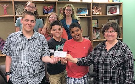 Youth present donations to Women's House Serving Bruce and Grey