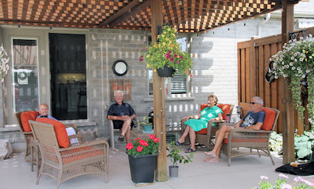 Haughs pleased to have their backyard and flowers part of garden tour for the first time