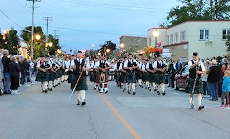 Kincardine Scottish Pipe Band is aglow for final Saturday Night Parade of summer