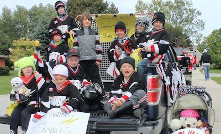 Cold, windy day for a fall fair parade in Tiverton