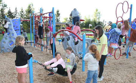 ​Students enjoying new playground at Ripley-Huron Community School