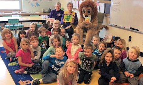 Tiverton Lions donate books to students at KTTPS