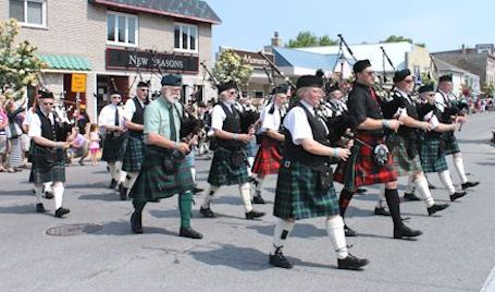 Huge crowd lines Queen Street for Parade of the Clans at Kincardine Scottish Festival
