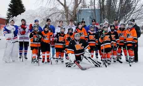 Kincardine Bulldogs, Kinucks celebrate game of hockey on outdoor rink