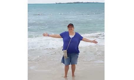 Where's Liz? At a beachside resort in the Bahamas