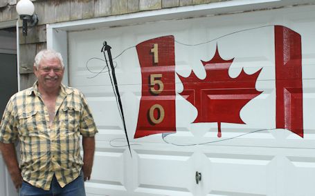 Kincardine man paints Canada-150 flag on garage door